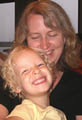 Anna with mom at a Nags Head, N.C., restaurant, summer 2004 / Photo by John E. Smith