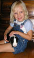 Anna with her pre-school guinea pig, Steve, September 2005 / Photo by Chris Harvey
