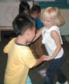 Anna dancing with a pre-school classmate, fall 2005 / Photo by a CYC teacher