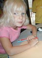 Anna at the drawing table at the Center for Young Children, fall 2005 / Photo by a CYC teacher