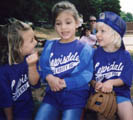 Aubrey, Valentina and Anna, chatting during T-ball, spring 2006 / Photo by Chris Harvey