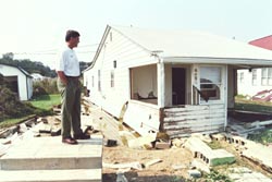 Gov. Robert Ehrlich Jr. surveys damage in North Beach, Md. (Photo by Tom Nappi / Courtesy the Governor's Office)
