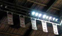 Jerseys from star players hang from Cole's rafters.