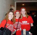 Seniors Beth Greenberg, Stephanie Grossman and Rachel Alberts (from left) attend their last game at Cole.
