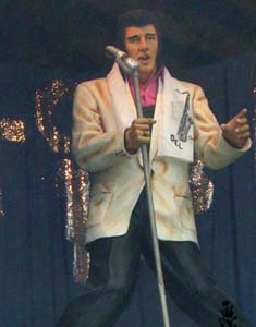 Elvis Presley statue in barn