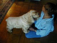 Vera at home with her dog, Honey.