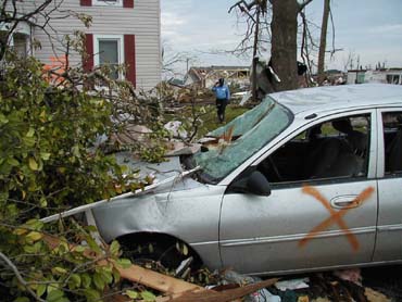 Home and car hit by tornado on Maple Avenue