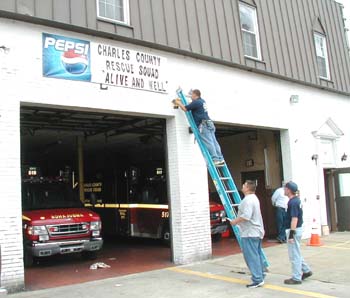 Charles County Rescue Squad posts a sign at its temporary station on Charles Street.