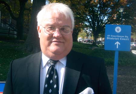 picture of Ralph Hall, 55, an inventor from stands in front of the historic Red Brick Courthouse in Rockville, Maryland