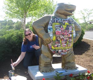 Jennifer Sterling outside the University of Maryland Golf Course with her Champions All turtle.
